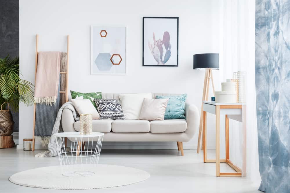 A cozy apartment living room in pastels