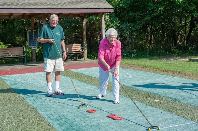 Seniors palying shuffle board